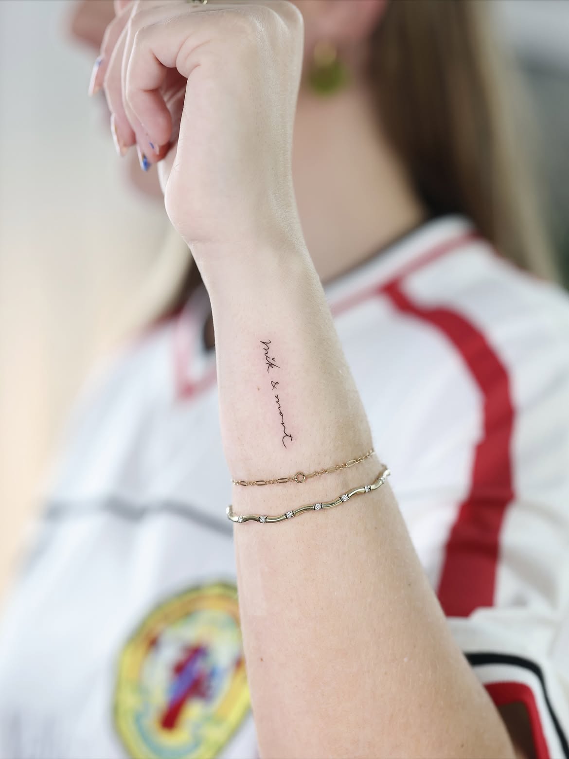 A simple and personal lettering tattoo placed delicately along the side of the wrist.Sometimes t